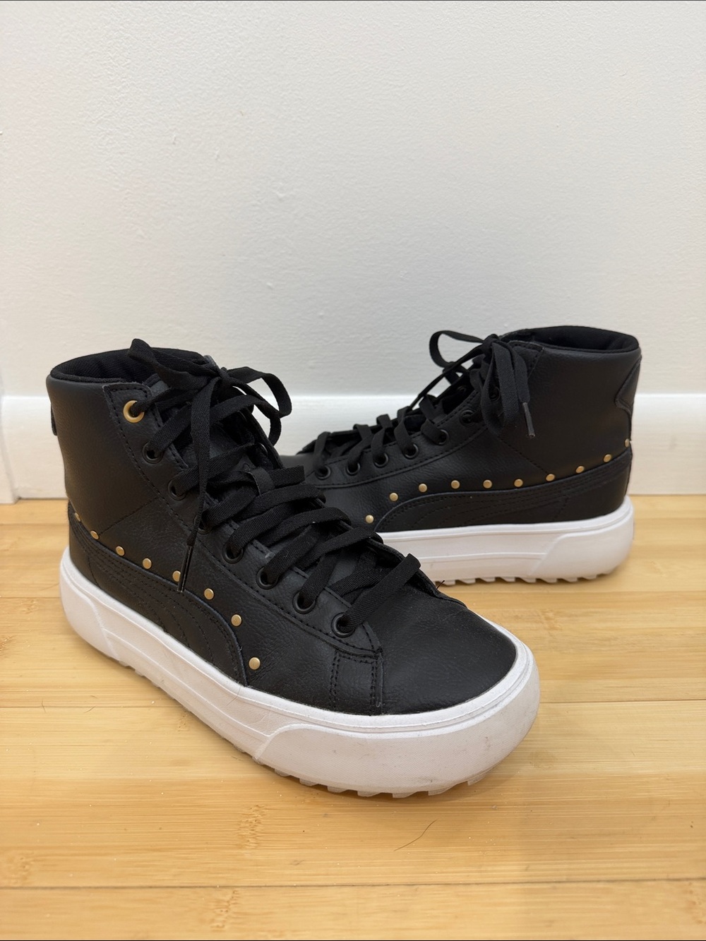 Puma Black Lace-Up High-Top Boots with Gold Stud Accents